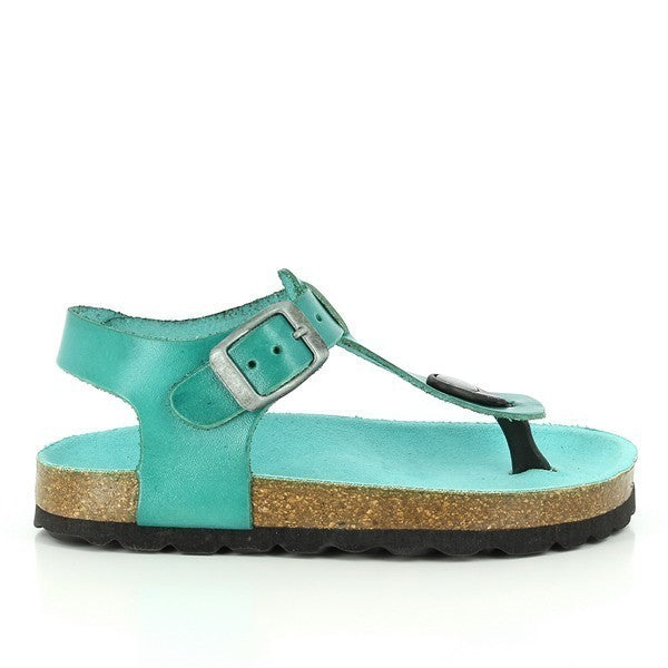 A pair of 111676 Aqua Kids Thong Sandals is displayed against a bright, sunny backdrop. The sandals feature a classic thong design with an adjustable buckle for a customized fit. The cork sole molds to the contours of the feet, offering comfort and support, while the leather upper exudes quality craftsmanship. These eco-friendly sandals are perfect for fashion-forward kids who care about the planet.
