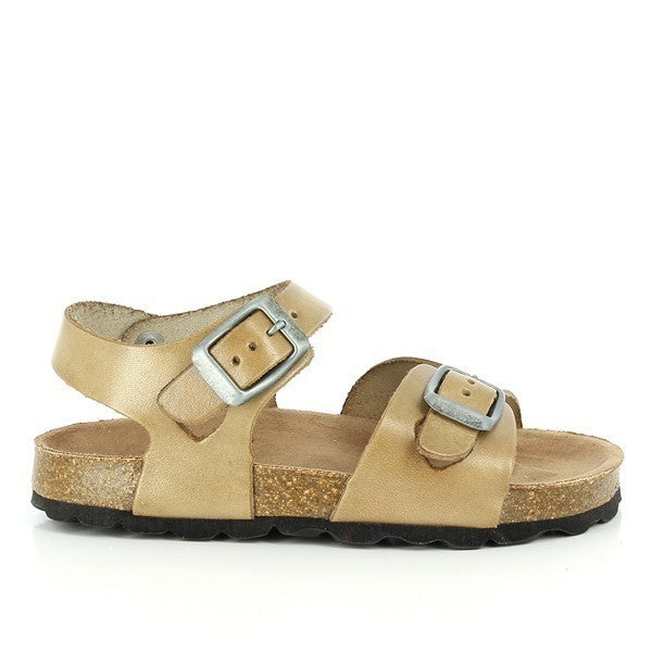 A close-up shot of the Plakton 115041 Beige Slingback Kids Sandals. The sandals feature a smooth leather upper in a soft beige hue, with adjustable straps and an ankle strap for a secure fit. The cork sole molds to the contours of the feet, providing comfort, while the synthetic orange sole adds a pop of color. Made in Spain, these sandals exude quality craftsmanship and eco-conscious design.