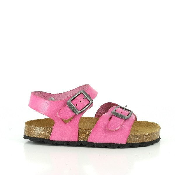 The photo captures a pair of vibrant 115041 Fucsia Slingback Kids Sandals against a clean, neutral background. The sandals stand out with their bold fuchsia color, exuding a playful charm perfect for children's footwear. The focus is on the adjustable slingback strap and ankle strap, showcasing the sandals' customizable fit for optimal comfort and support. The cork sole, highlighted by the slight heel-platform, promises cushioned steps and long-lasting comfort.