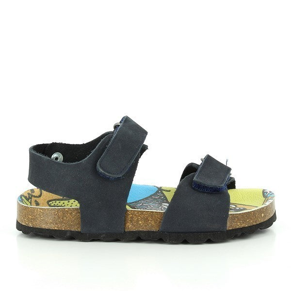 The photo showcases Plakton's 115093 Navy Slingback Kids Sandals from the side, highlighting the sleek navy leather upper and adjustable straps, ensuring a secure fit.