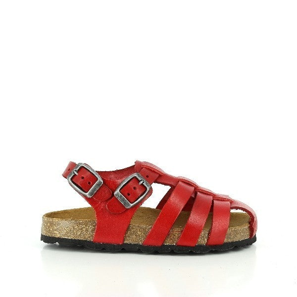 The image showcases Plakton's 115096 Ruby Kids Cage Sandals, featuring a vibrant ruby red color and a stylish cage design. Crafted with eco-friendly cork soles and leather uppers, these sandals offer both comfort and sustainability. The adjustable ankle strap ensures a secure fit, while the round toe shape provides ample room for little toes to move freely. Made in Spain with meticulous attention to detail, these sandals are perfect for your child's summer adventures.