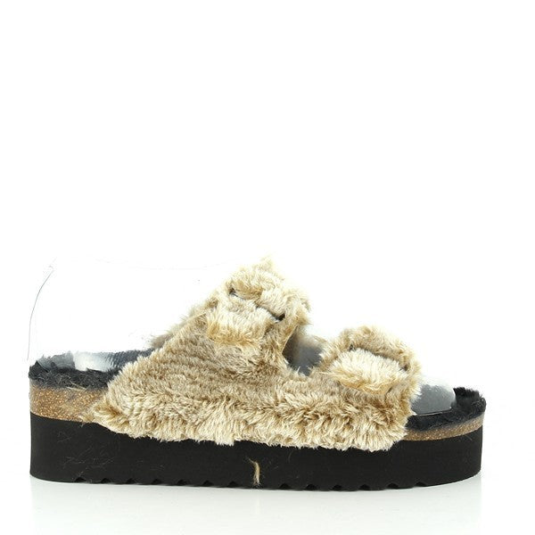 Step into sophistication and comfort with Plakton's 280010 Toffee Fur Platform Sandals. Crafted with plush fur lining and a cork sole, these sandals blend style with sustainability. Perfect for any occasion, from casual outings to evening events.